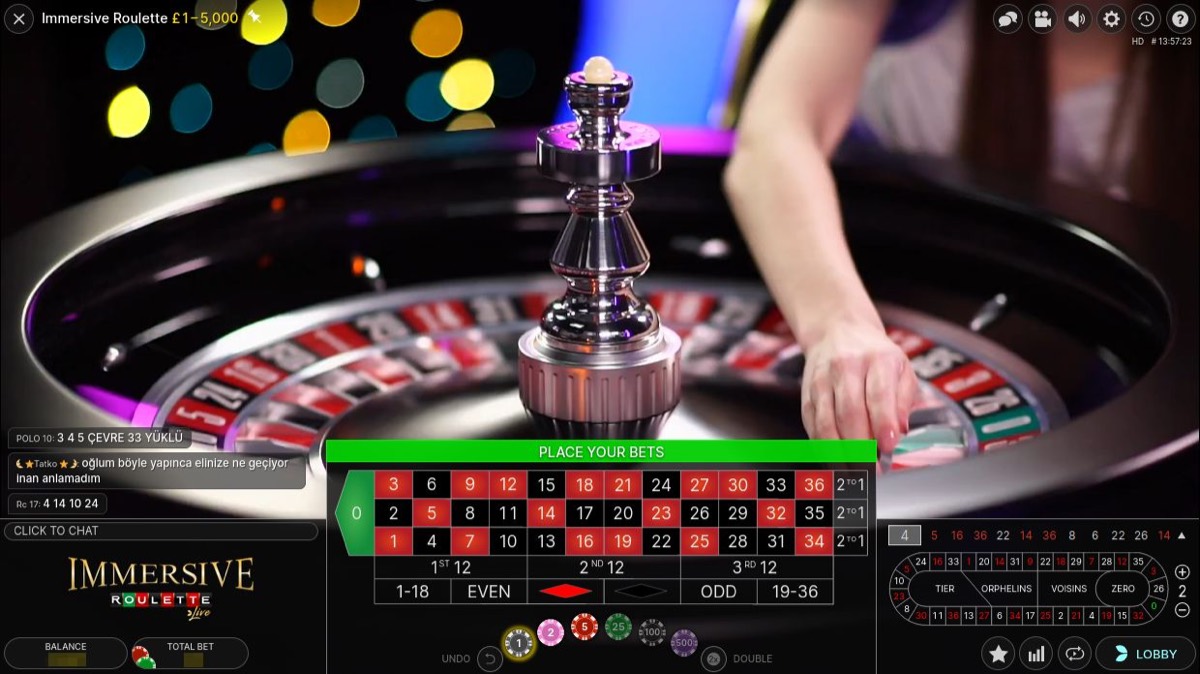 Casinomhub canlı casino Immersive Roulette arayüzü — krupiye yayını ve bahis grid'i